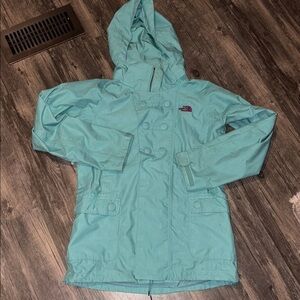 The North Face Aqua HYVENT womans jacket - small
Teal/ purple